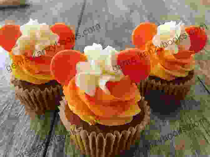 Mickey Mouse Cupcakes Decorated With Orange Frosting And Candy Corn To Resemble Pumpkins Disney Halloween Recipes: Easy To Make Disney Halloween Treats: Halloween Desserts